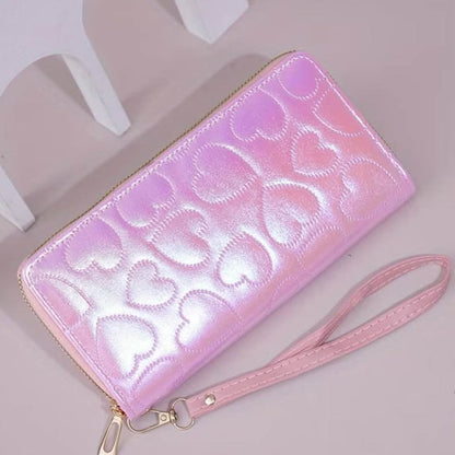 Hermosa billetera rosada con diseño de corazones