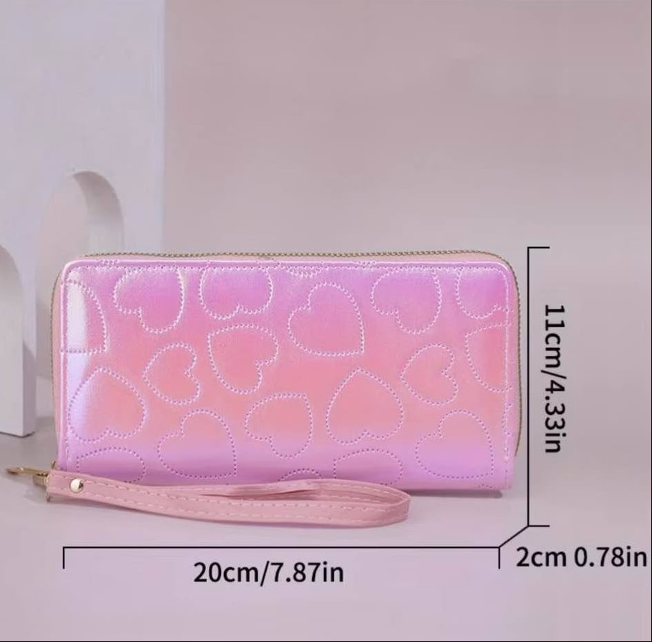 Hermosa billetera rosada con diseño de corazones