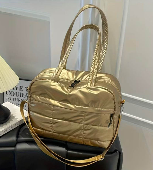 Elegante maletin color dorado modelo limitado