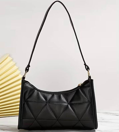 Cartera elegante color negro con diseño de rombos