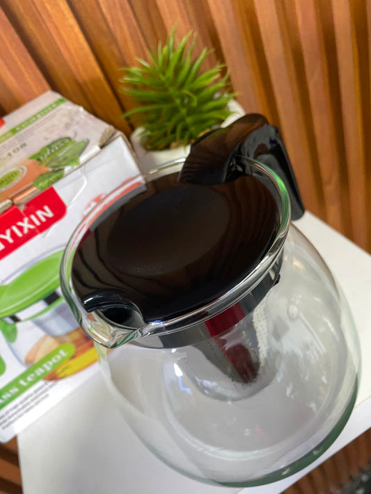 Tetera con ponedor de hierbas