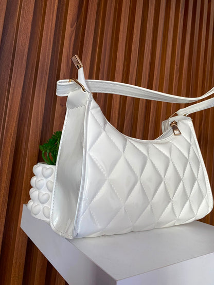 Cartera rombos disponible color blanco