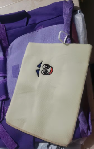 Mochila de Dora la exploradora incluye cartuchera en forma de mapa